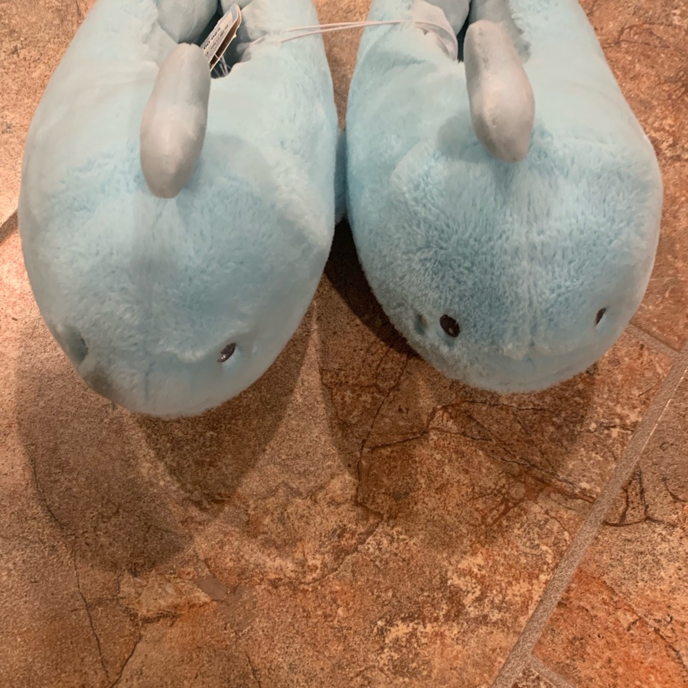 Buy 1 get one 50% off kids shoes 
Cat & Jack Light Blue Narwhal Slippers